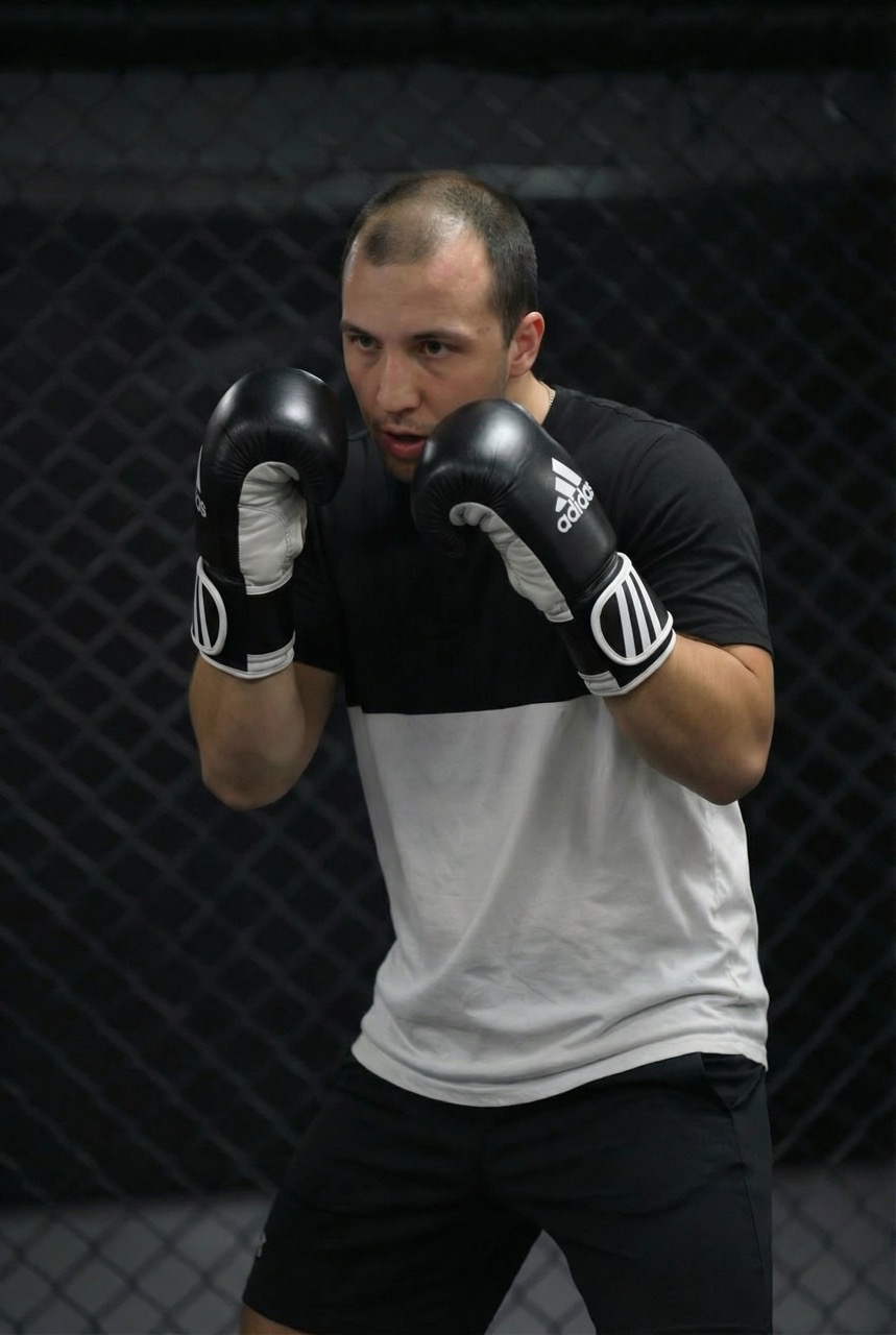 Gymnasia boxing coach Nika Modebadze training in the boxing zone