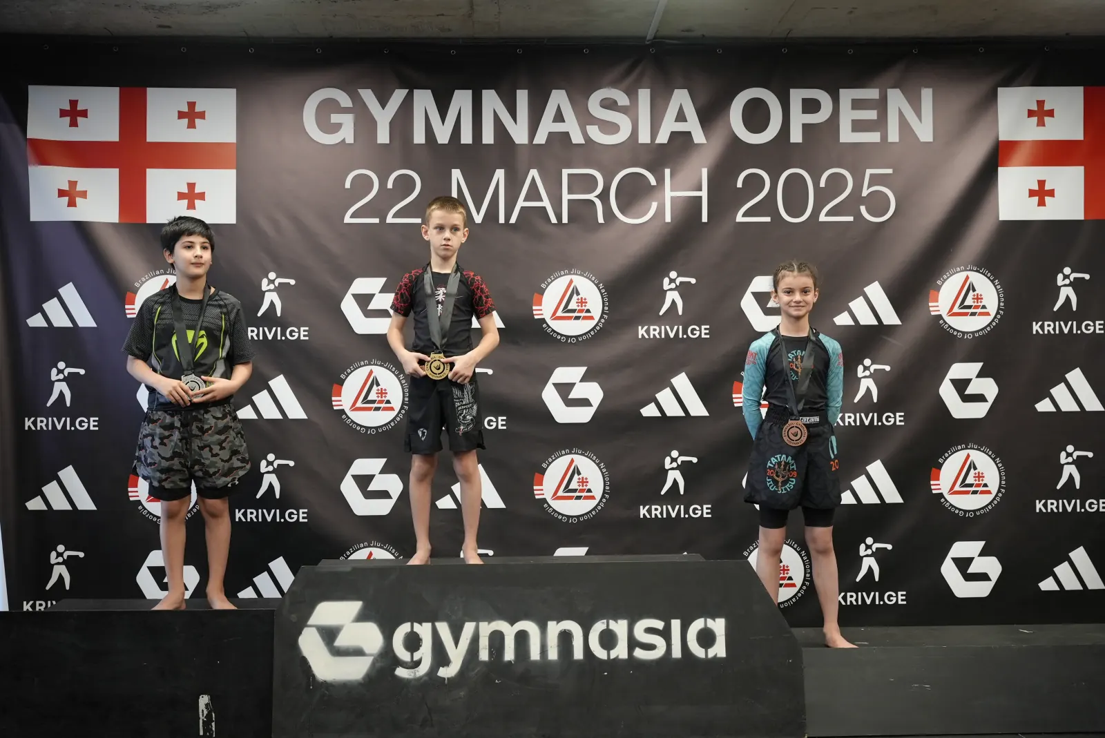 Gymnasia kids on the podium at Gymnasia Open